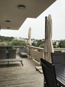 Balkón nebo terasa v ubytování Moderner Bungalow mit Meerblick