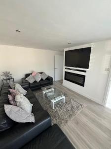 TV a/nebo společenská místnost v ubytování Beach way