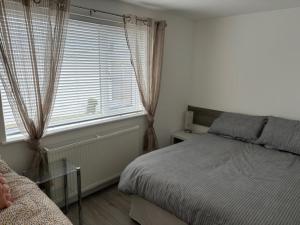 Postel nebo postele na pokoji v ubytování Beach way