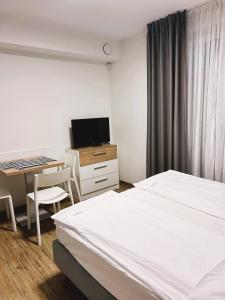 Postel nebo postele na pokoji v ubytování Apartamenty Villa Baltica Rewal - jacuzzi na dachu, wi-fi, parking w cenie