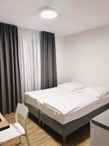 Postel nebo postele na pokoji v ubytování Apartamenty Villa Baltica Rewal - jacuzzi na dachu, wi-fi, parking w cenie