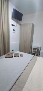 Katil atau katil-katil dalam bilik di B&b Regina Elena - Calabria