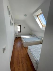 Postel nebo postele na pokoji v ubytování Dom Wrota Mazur + 19 fotografií