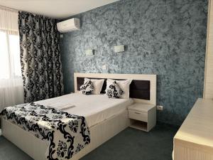 Postel nebo postele na pokoji v ubytování Vila Zara + 29 fotografií