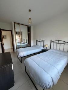 Postel nebo postele na pokoji v ubytování Acogedor apartamento con jardín + 23 fotografií