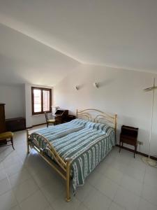 Postel nebo postele na pokoji v ubytování Casa Rina