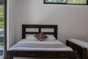 Postel nebo postele na pokoji v ubytování Playa Negra Home's CR