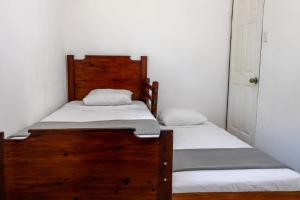 Postel nebo postele na pokoji v ubytování Playa Negra Home's CR