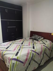 Ένα ή περισσότερα κρεβάτια σε δωμάτιο στο Apartamento primavera