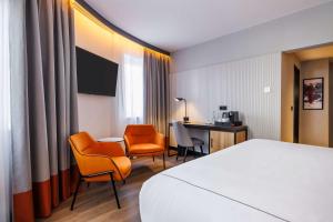 Postel nebo postele na pokoji v ubytování Radisson RED Berlin Kudamm