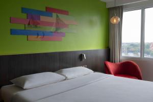 Postel nebo postele na pokoji v ubytování Park Inn By Radisson Iloilo