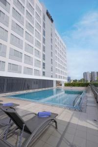 Bazén v ubytování Park Inn By Radisson Iloilo nebo v jeho okolí
