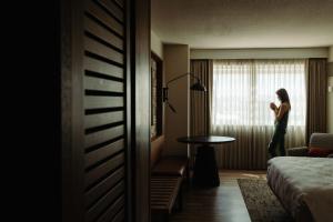 A bed or beds in a room at Sheraton Phoenix Downtown