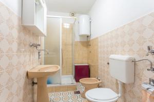 Koupelna v ubytování Apartments and rooms with parking space Supetar, Brac - 5658