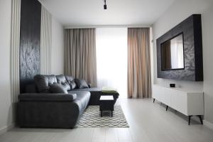 Khu vực ghế ngồi tại KARIMI Apartment - Grand Kristal Residence Bucuresti