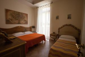 A bed or beds in a room at B&B Nel Regno di Napoli