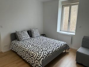 Ένα ή περισσότερα κρεβάτια σε δωμάτιο στο Appartement VII - Haut Standing