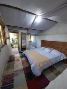 Postel nebo postele na pokoji v ubytování Glamping El Mirador de las estrellas