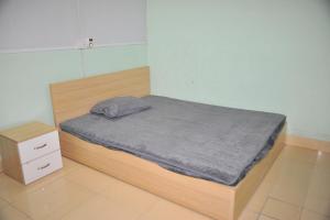 Postel nebo postele na pokoji v ubytování nhatrodongme