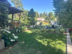 a yard with a gazebo and a picnic table at Creekside Setting Right Near Downtown And Bogert Park in Bozeman