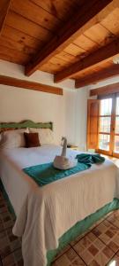 Postel nebo postele na pokoji v ubytování Hotel Tierra Maya