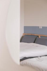 Voodi või voodid majutusasutuse Fish Tears B&B toas