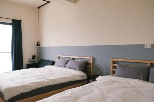 Voodi või voodid majutusasutuse Fish Tears B&B toas