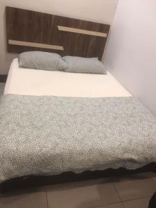 Postel nebo postele na pokoji v ubytování Ap Classic Hotel