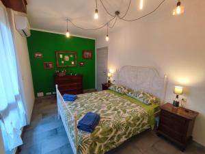 Postel nebo postele na pokoji v ubytování Casa Lilly