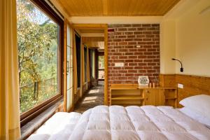 Postel nebo postele na pokoji v ubytování Seegreen Lodges + 26 fotografií