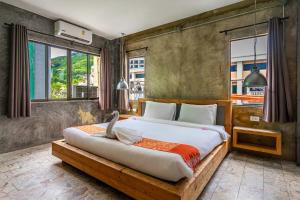 Postel nebo postele na pokoji v ubytování Unotel Karon Beach