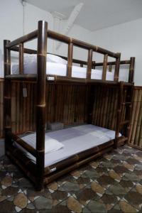 Letto o letti in una camera di Backpacker Kawah Ijen