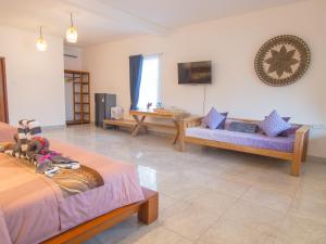 Posteľ alebo postele v izbe v ubytovaní CoCo Breeze Spa Hotel