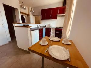 Kuchyň nebo kuchyňský kout v ubytování Albuconis 2 Appartement 1 chambre