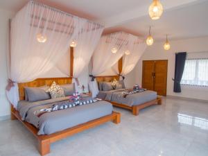 Posteľ alebo postele v izbe v ubytovaní CoCo Breeze Spa Hotel