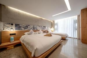 Llit o llits en una habitació de 慢境Slow Land半山海景花园酒店