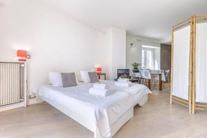Posteľ alebo postele v izbe v ubytovaní Le Bellevue 04 - Happy Rentals