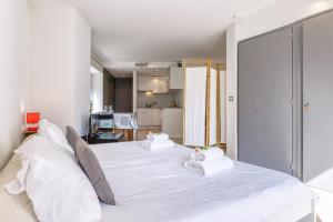 Posteľ alebo postele v izbe v ubytovaní Le Bellevue 04 - Happy Rentals