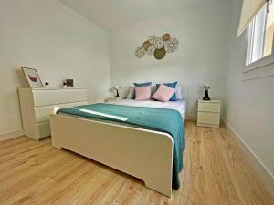 Postel nebo postele na pokoji v ubytování Apartamento Aurora - Ole Solutions