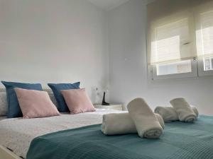 Postel nebo postele na pokoji v ubytování Apartamento Aurora - Ole Solutions