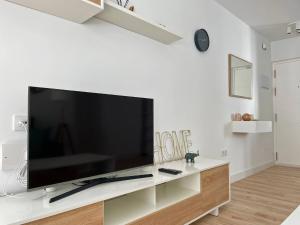 TV a/nebo společenská místnost v ubytování Apartamento Aurora - Ole Solutions