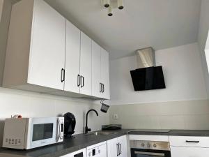 Kuchyň nebo kuchyňský kout v ubytování Apartamento Aurora - Ole Solutions