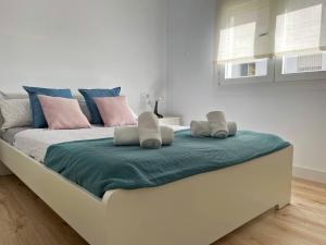 Postel nebo postele na pokoji v ubytování Apartamento Aurora - Ole Solutions
