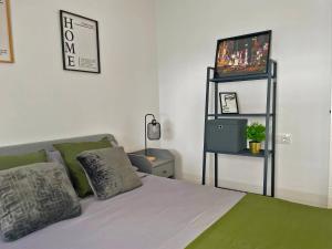 Postel nebo postele na pokoji v ubytování Apartamento Aurora - Ole Solutions