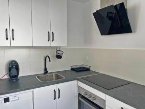 Kuchyň nebo kuchyňský kout v ubytování Apartamento Aurora - Ole Solutions