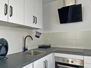 Kuchyň nebo kuchyňský kout v ubytování Apartamento Aurora - Ole Solutions