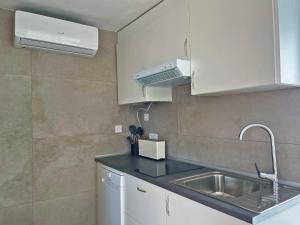 Kuchyňa alebo kuchynka v ubytovaní Apartamento Klandestina - Ole Solutions