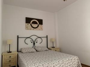Łóżko lub łóżka w pokoju w obiekcie Apartamento Galeón - Ole Solutions
