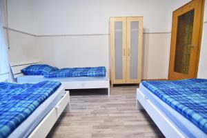 Ein Bett oder Betten in einem Zimmer der Unterkunft Apartment Köln Porz