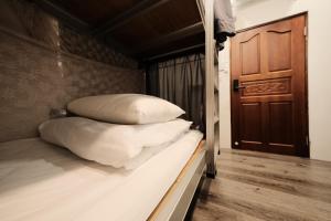 Postelja oz. postelje v sobi nastanitve 小艾背包客棧 Small Eye Backpacker